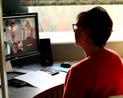 Photo of a member taking part in an online session